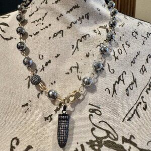 Titanium Plated Hematite Necklace with Rhinestone Bullet Pendent